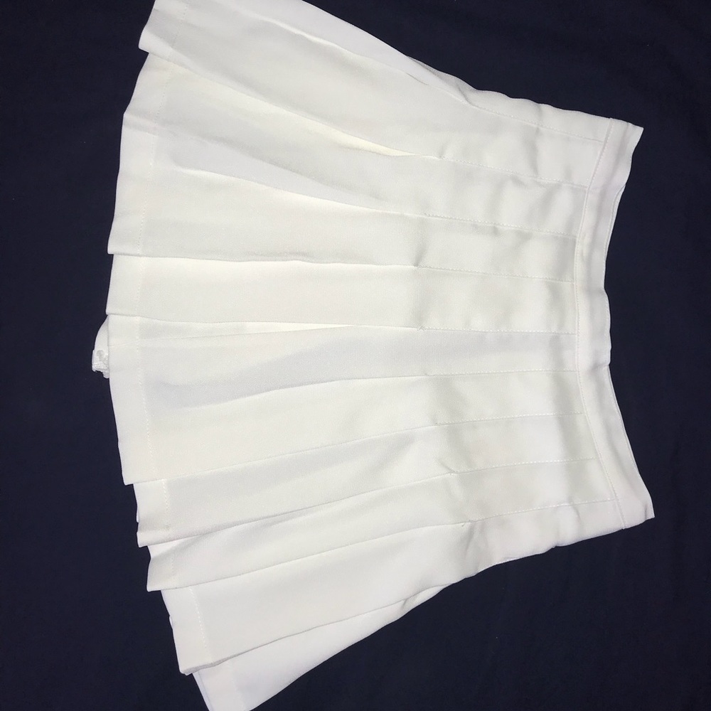 White pleated skirt